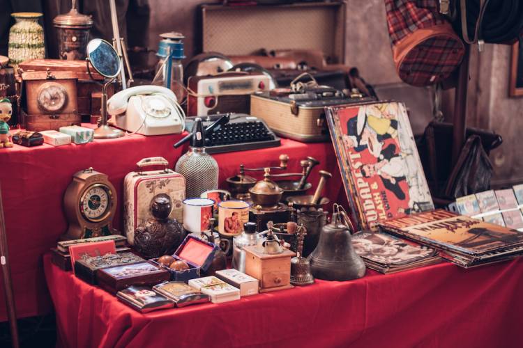 vintage goods on a table at an antique store