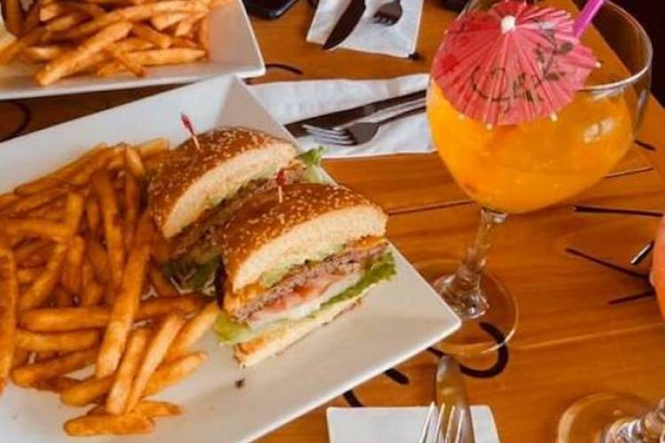 sandwich, fries and a cocktail 