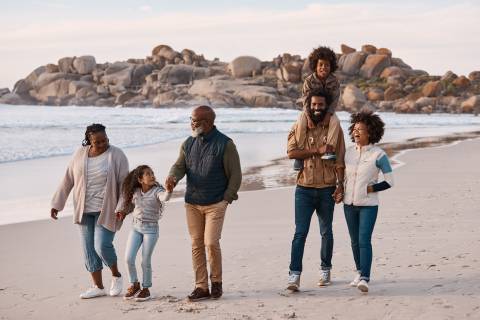 family walking on beach